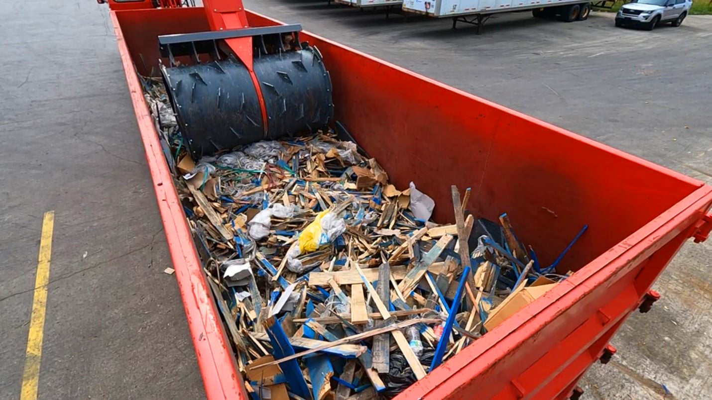 Smashed Dumpster of Pallets